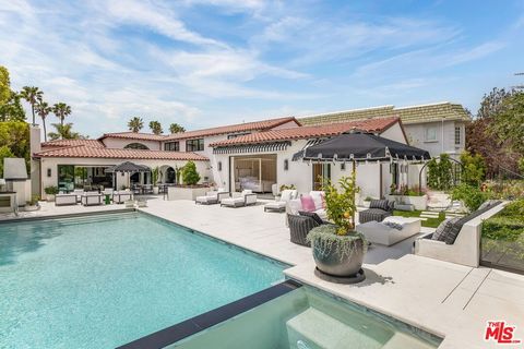 Nestled in the exclusive guard-gated Ridgeview Country Estates off of Shadow Mountain Drive, 1445 Via Cresta is a newly constructed Spanish Contemporary masterpiece offering the pinnacle of privacy, sophistication and indoor-outdoor living. Thoughtfu...