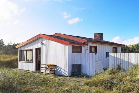 Authentic cottage located on a 4000 m2 large hilly natural plot built nicely into the landscape at Nr. Lyngvig. From the house you can walk up the dune to the west, from where there is a wonderful panoramic view in all directions with both fjord, hea...