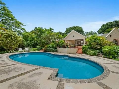 Welcome to Serenade! This beautiful four bedroom property is nestled in lush tropical gardens extending to 1.33 acres. It is surrounded by mature trees and is beautifully positioned next to the 6th green of the Sandy Lane Old Nine golf course. This s...