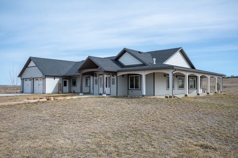Located just outside the quaint town of Moorcroft, Wyoming discover the epitome of rural tranquility with this exceptional property nestled on 41 +/- acres of countryside. This meticulously maintained, main level living home features 3 bed, 2 baths a...