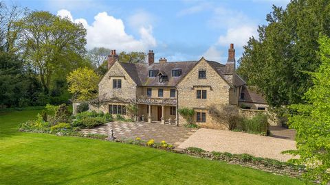 A distinctive former Rectory, listed Grade II, of coursed rubblestone construction under an old tile roof with two date stones carved 1607. The central section of the building has a 17th century style colonnade with a pierced balustrade fronting a fi...