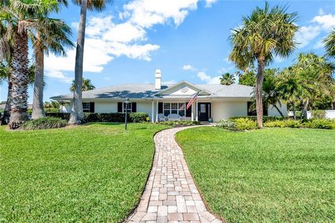 East of A1A! Pristine 4BR/3BA split plan home. Inside crown moldings & neutral tile floors run thruout & Plantation shutters dress windows. Formal living rm has frplc & built-ins. Kitchen updated w/ granite counters & opens to family rm & pool. Pool ...