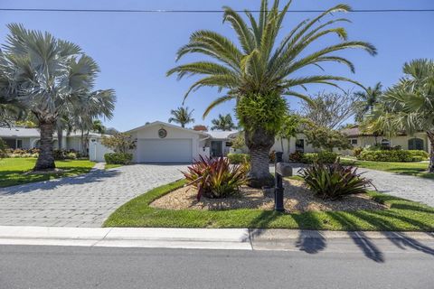 One or more photo(s) has been virtually staged. Your paradise awaits! Pull up to this prime waterfront location by land or sea. Nestled on the picturesque shores of Treasure Island, 23 Island Drive offers the ultimate Florida dream lifestyle. Boastin...