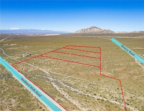 Seize a prime investment opportunity in Apple Valley with this 25-acre lot located between Stoddard Wells Rd, Quarry Rs, and Fairfield Ave. Ready for development, this property offers immediate access to water and electricity, setting a seamless foun...