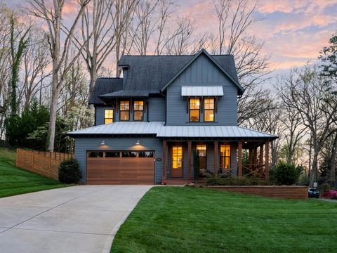 Nestled in the prestigious Cotswold community, this stunning Modern Farmhouse merges rustic charm w/ modern sophistication. Step inside to pristine White Oak floors and meticulous trim details such as cedar beams, wainscoting, shiplap, and cove crown...