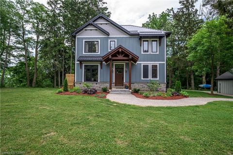 Live your best life in Beautiful Port Stanley in this absolutely gorgeous 4 bedroom / 4 bathroom custom built luxurious home. Nestled on a 2.4 acre landscaped private wooded ravine lot, this home has 9 ft ceilings on each level, transom windows, quar...