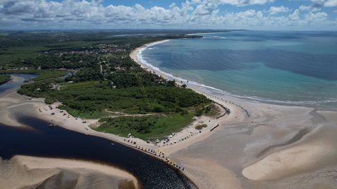 Pontal de Maracaípe Located on the stunning Maracaípe Beach in Pernambuco, Brazil. With the Maracaípe River on one side and the Atlantic Ocean on the other, it provides a masterpiece of nature. During low tide, natural pools of crystal-clear water fo...