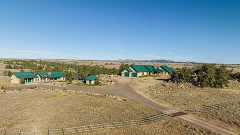 Located halfway between Laramie and Cheyenne Wyoming, tucked out of the way and at the end of the road, sits the Shimmerhorn Ranch! The Ranch is a rare find of its size and location and is nestled into a setting that is rich in history and full of op...