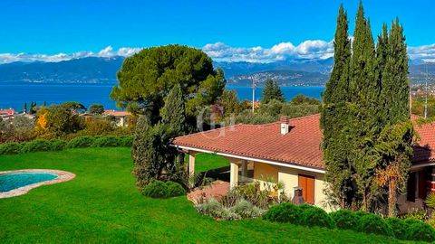 Prestigious stately villa overlooking Lake Garda, surrounded by greenery, olive trees and vines. Located in tourist area in an absolutely quiet and sunny position about 2 km from the town center and 250 meters from the lake shore; with exclusive swim...
