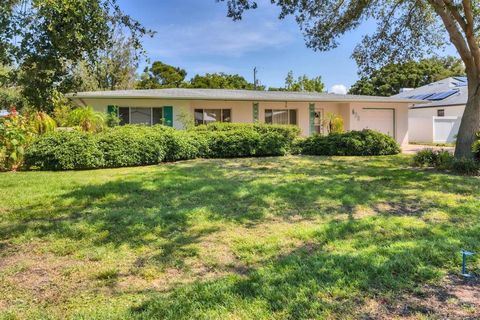 Nestled on the coveted Island of Venice, this rarely available 1960s original home exudes timeless charm with Terrazzo floors and vintage tile and cabinetry. The large brick paver driveway leads up to the expansive 1565 square feet home set on a spac...