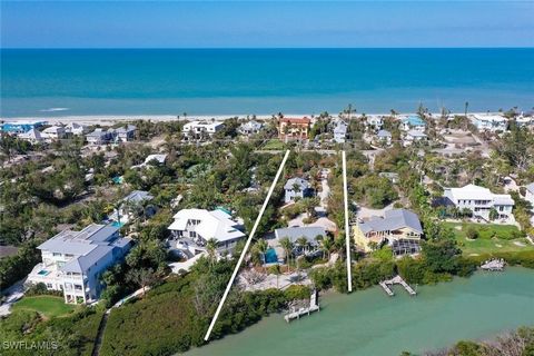 Discover the ultimate island retreat with this exceptional 1.4-acre bay front estate parcel on Captiva’s coveted Roosevelt Channel. Nestled among lush, mature vegetation, this property offers breathtaking waterfront views, abundant wildlife, and a pr...