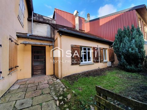Maison mitoyenne de deux appartements