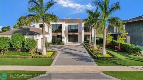 HUGE PRICE IMPROVEMENT! This Bomar built home is located in Fort Lauderdale's Newest and Most Prestigious new construction community - The Enclave! The Enclave is an exclusive guard gated community of just 36 lots - this lot is arguably one if the be...