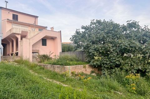 The island of Krk, Baška, Draga Bašćanska, old stone house surface area 118,16 m2 for sale, with garden of 175 m2, in a quiet location. The house consists of basement with tavern, ground floor with two rooms with separate entrances, first floor with ...
