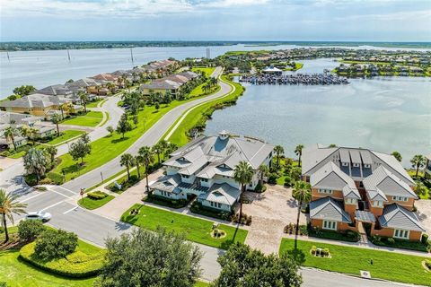 Enjoy waterfront living in this bright, beautifully finished, 3-bedroom carriage-style home located at The Lagoon, a prestigious 24-hour guard-gated community in desirable Tidewater Preserve on the Manatee River - one of the finest boating communitie...