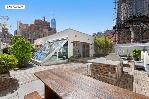 Sun-kissed luxury penthouse living awaits in this sprawling three-bedroom, four-and-a-half-bathroom duplex loft featuring exquisite industrial-meets-modern interiors and a massive rooftop terrace atop a full-service boutique condominium in the heart ...