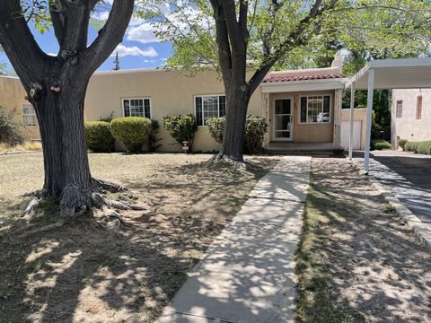 Great location near UNM, Airport and Hyder Park. Nice 2 bedroom home with 2 living areas, and an extra bedroom/office downstairs. Master cool is newer, windows are newer vinyl double pane. There's a large backyard with lots of shade!