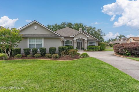 Welcome home to Fleming Island! There are so many reasons to love this 4 bedroom/3 bath Eagle Harbor Home but....these are my top ten: 1. Awesome -3 way split floor plan (4 beds/3 baths) 2. All hardwood flooring and tile throughout 3. Large open conc...