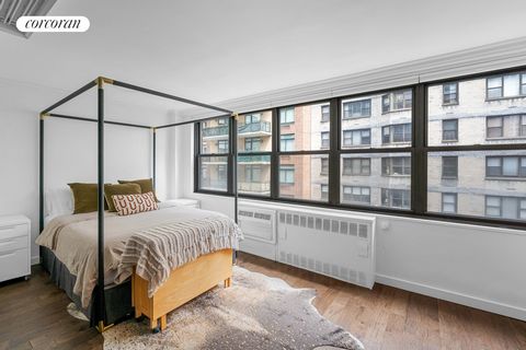 Introducing 209 East 56 Street, Sutton Place, New York City. This stunning junior one-bedroom is located in a full-service building, offering a range of amenities and a prime location. Situated on a high floor, this unit boasts a wall of windows, flo...