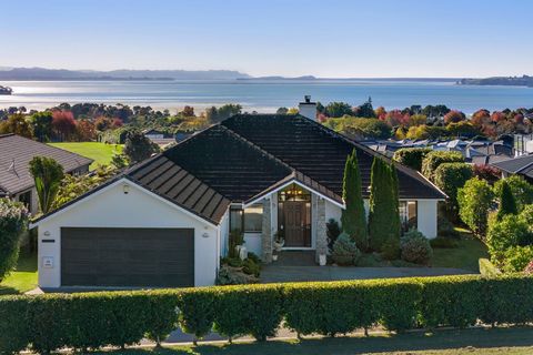 This gorgeous and glamorous home has an elevated position on one of Omokoroa's premium addresses, and immediately captivates with its attractive plaster over brick and schist facade and breathtaking views of the harbour and Kaimai Ranges. The home is...