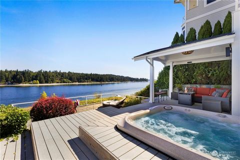 Waterfront Paradise! Stunning elevated, panoramic waterfront and mountain views stretching from Seattle to Edmonds. Whether you're seeking a fully furnished, highly lucrative Airbnb with Superhost status, or a luxurious personal residence, this prope...