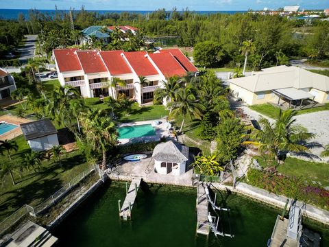 Located in the serene Bell Channel Bay area of Freeport, Grand Bahama, this luxurious 3-bedroom, 3-bathroom unit offers unparalleled waterfront living. Situated within the prestigious Marina Bay Condominiums, this exclusive residence boasts direct ac...