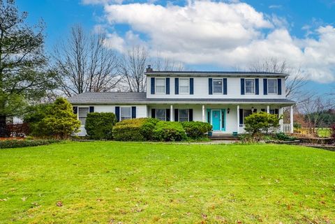 Situated on over 3 acres on a cul-de-sac street, this well maintained colonial in Aurora’s Bridle Path Estates awaits a new owner. The main floor features a spacious step-down living room and formal dining room. The eat-in-kitchen offers plenty of st...