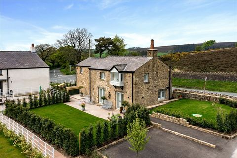 A magnificent modern detached stone built cottage that benefits from outstanding panoramic views set in a small cluster of five properties offering stylish living both inside and out. Internally the accommodation affords a Hallway with part glazed ex...