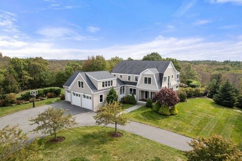 Nestled on a private cul-de-sac, this hilltop home is surrounded by conservation land and has distant ocean views. Constructed in 2013 to the highest standard, the home has been improved and enhanced by the current owners. No expense has been spared ...