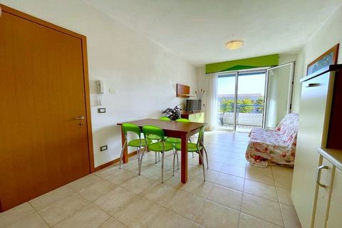 This welcoming first-floor apartment on Viale dei Gabbiani 3 in Lido Altanea, Caorle, is ideal for families or small groups seeking a beachside escape. Just 500 meters from the sea, the home offers a cozy living room with a double sofa bed, TV, dinin...