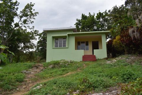 Attractively priced 2BR 1BA home on 1 acre of land located in Inglewood District. A peaceful farming community served by the Mile Gully Post Office. This fruited property consists of mangos, jack fruit, star apple, papaya, just to name a few. The pro...