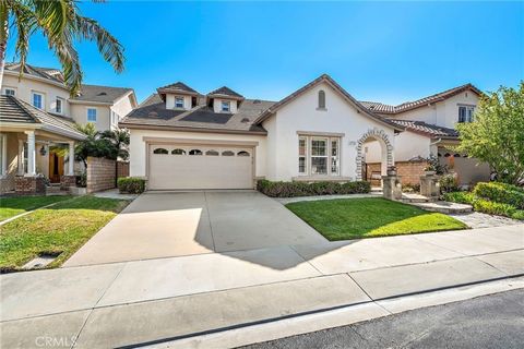 Panoramic View, Main floor Master bedroom, Re-piped, No Mello-Roos. Impeccable luxury living awaits you in this 4 bedroom + Den/office, 3 bathroom, 3 car garage rare gem nestled within the prestigious 24-hour guard-gated community of San Joaquin Hill...