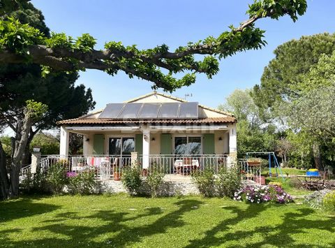 Ref 68008CJ: Ideally located between Avignon and Nîmes, on the outskirts of a pretty village, this traditional single storey house will seduce you with its renovation and its vast garden (4,869 m²) planted with fruit trees and a part planted with 'ar...