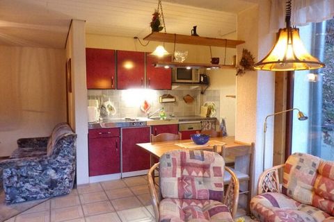 The cozy holiday apartment is very popular because of the cozy winter garden, which is directly connected to the living room and through which you can access the adjacent south-east terrace. From here you can enjoy a clear view of the surrounding mou...