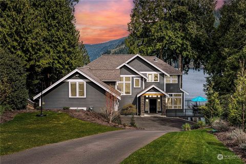 Experience the joy of everyday living in this stunning retreat on 85' of Lake Whatcom waterfront. Step inside and you'll be swept away by the serene atmosphere & dramatic lake views. Entertaining is effortless with the great room opening to an expans...