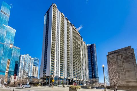 Welcome to 400 E Randolph, Apt. 1018, a meticulously remodeled 1-bedroom, 1-bathroom condo in the heart of Chicago. This 850-square-foot residence offers a spacious living environment enhanced by a generous 18-foot balcony, providing stunning city an...