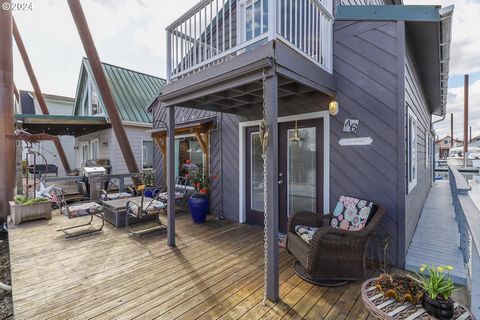 Ready to Sell Now! Beautiful 1 bedroom + den/and a non conforming sleeping room with a jetski garage. Mezzanine area for Office or Den area. Bring some country to the river. Oversized front porch facing east for Morning coffee. The 2 decks on the 2nd...