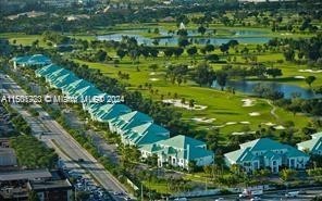 PROVIDENT AT THE BLUE This beautiful fully furnished first-floor condo located in the heart of Downtown Doral. This property is perfect for Airbnb hosting, a relaxing vacation home, or a lucrative investment opportunity. It features top-of-the-line a...