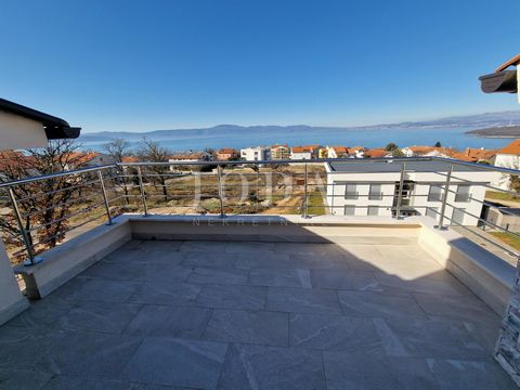 Location: Primorsko-goranska županija, Omišalj, Njivice. An apartment with a sea view is for sale in Njivice on the island of Krk! The apartment is located in a high attic and has a surface area of 67.72 m2. It consists of a living room with a kitche...