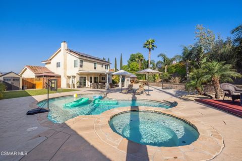 Your summer will sizzle in this remarkable, one-of-a-kind Moorpark pool home, situated at the end of a desirable cul-de-sac in the North View neighborhood. Your personal resort property is set on an expansive 12,339 sq.ft. lot and features a sandy be...