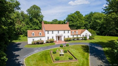 Welcome to this magnificent 6-bedroom, 3.5-bathroom residence nestled on over 2 acres of lush grounds in the prestigious Greenfield Hill neighborhood of Fairfield. This stunning property features an in-ground swimming pool and offers a grand great ro...