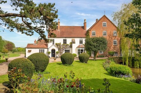 A superb period water mill set in tranquil and beautiful surroundings yet ideally located for today’s family life. The property stands within glorious gardens and benefits from a superb range or traditional outbuildings and outdoor facilities, with g...
