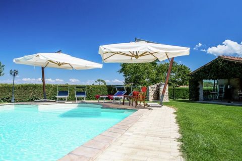Set in the heart of Umbria, in Marsciano, this is a 2-bedroom holiday home that can accommodate 6 persons. There are a swimming pool and a barbecue to have an exotic vacation. You can stay here with your family or group of friends. The holiday home i...