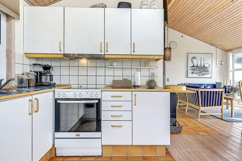 Holiday home located in the front row with panoramic views of the Kattegat and towards the protected area. The cottage has a nice bright kitchen with underfloor heating in open connection to the living room with heat pump and wood stove as well as se...
