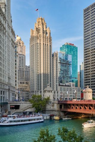 Step into the pinnacle of luxury living at Tribune Tower Residences, Chicago's most iconic building. This one-of-a-kind duplex residence redefines elegance with its breathtaking 3-bedroom layout, featuring soaring 20ft ceilings, a private balcony, an...