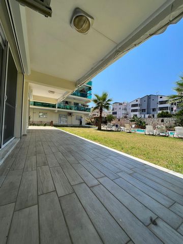 3 bedroom garden duplex on 2 floors. located only 5 minutes from Altinkum Beach front.  Features: - Air Conditioning - Alarm - Balcony - Barbecue - Concierge - Dining Room - Doorman - Dishwasher - Garden - Furnished - Intercom - Internet - Lift - Poo...