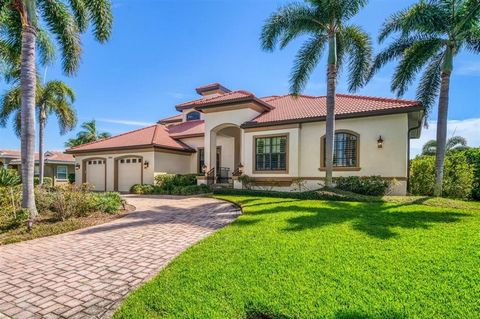 This Waterfront Home is located in the community of Venetian Isle. Southern Comfort is built into the design of this Custom home. The pavered circular drive sets the ambience of the many tasteful details. Welcome, step through the beautiful double do...