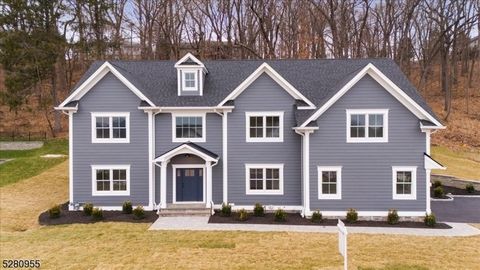 PREPARED AND AWAITING ITS NEW OWNER! Crafted by a trusted local builder, this residence boasts 7 bedrooms, 6 1/2 baths, and upscale features including Wolf and Sub-Zero appliances, low-maintenance Hardie siding with azek trim, white oak flooring, a f...