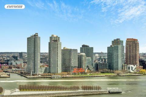 Showings begin April 21st. Enjoy your morning cup of coffee & watch the boats sail by along the river! Perched on the 20th floor, this coveted two bedroom / two bath apartment offers fabulous, direct East River views from every window. Sunlight strea...