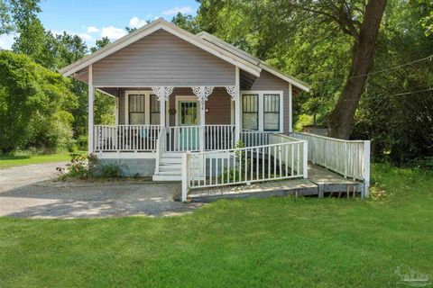 CHARMING East Hill home located in PACE !!! This adorable cottage was moved from East Hill and placed on this beautiful large lot over half an ACRE !!! This three bedroom two bath has all of the original historic charm still in tact from the doorknob...